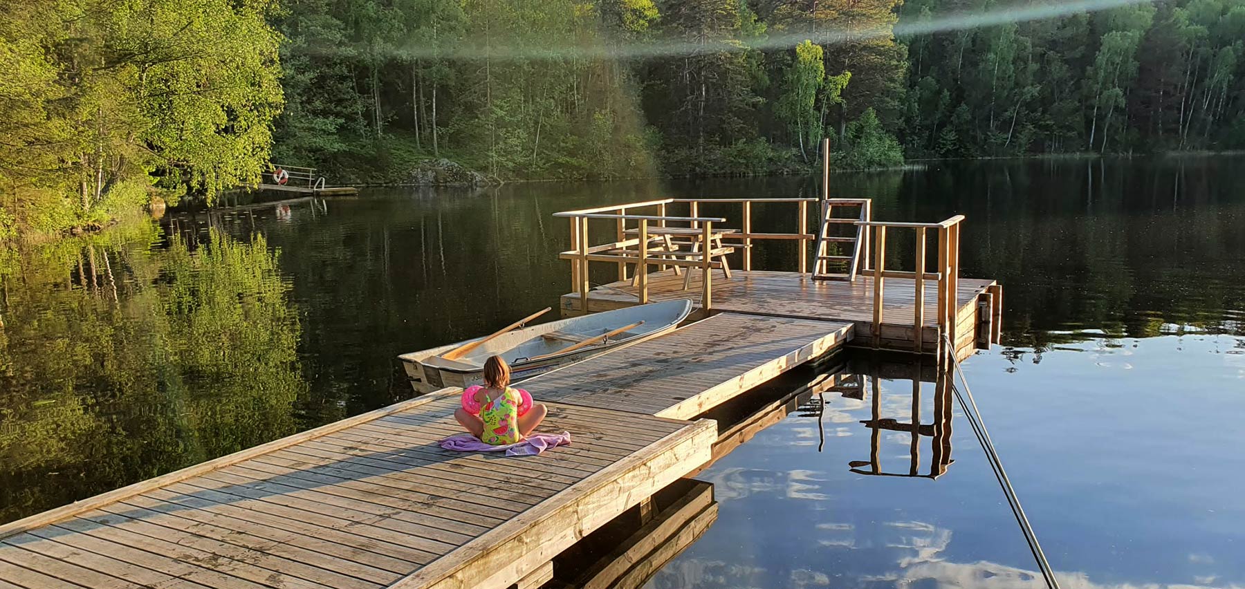 Wooden dock and swimming area on the lake